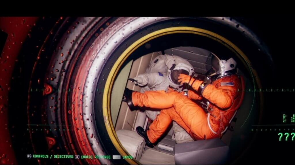 Tripulantes em um dos módulos da estação espacial