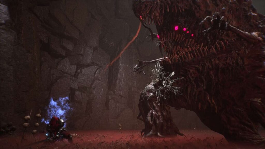 Chefes gigantescos são característicos de jogos soulslikes.